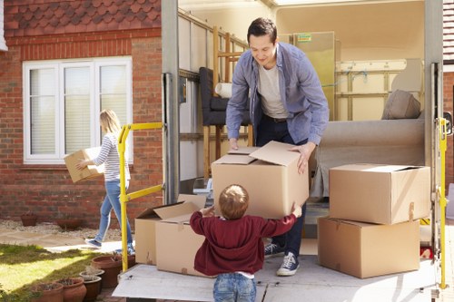 Man and van loading furniture for a Belgravia move