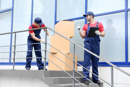 Removal team planning a house move on a Belgravia street