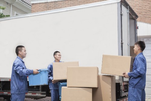 Careful loading of household items for a Belgravia home removal