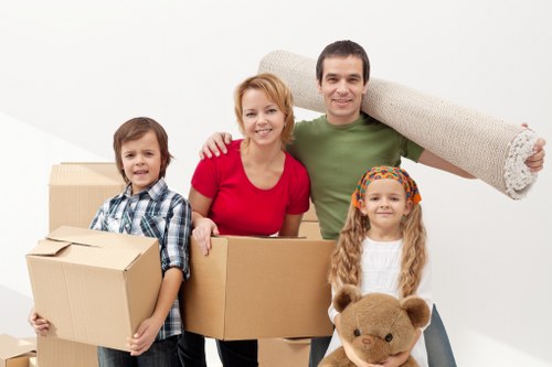Professional movers handling belongings in central London