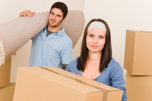 Man and van service preparing boxes and furniture for transport