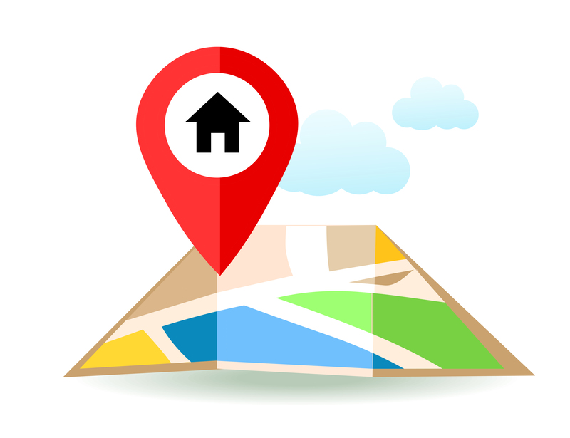 Movers handling furniture carefully in a central London property